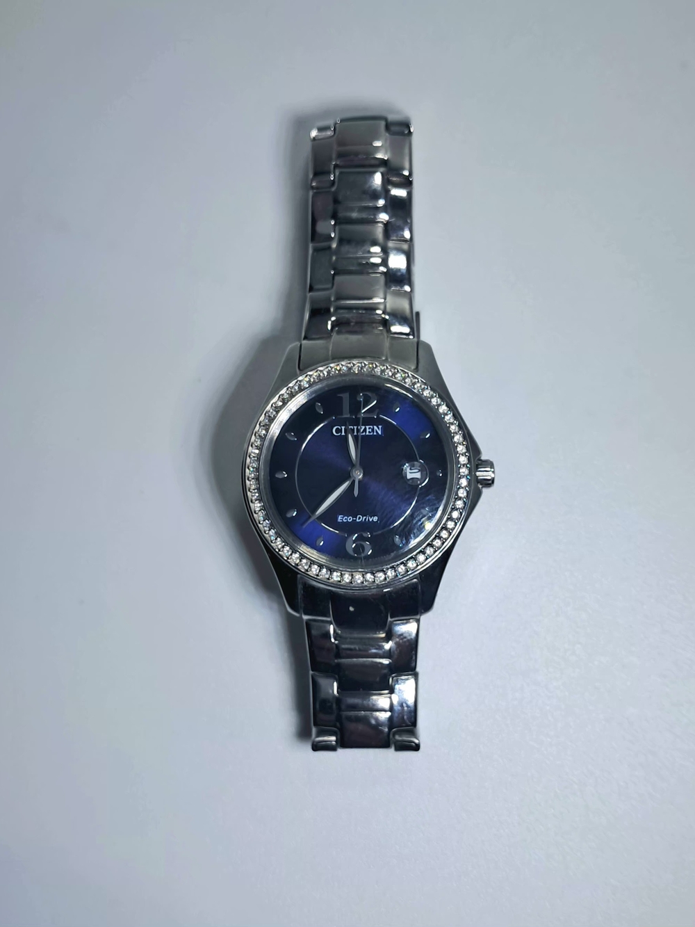Citizen Eco-Drive Silhouette Crystal Ladies Watch Blue Dial Silver Tone FE1140-8